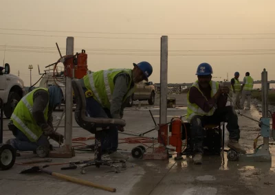 Workers drilling cores in concrete