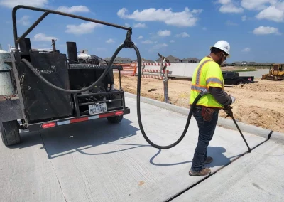 Worker and truck Sealing Expansion Joints